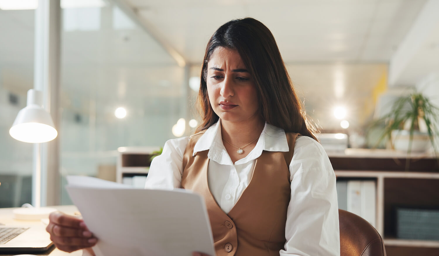 Concerned business professional reviewing a HubSpot partner proposal for red flags