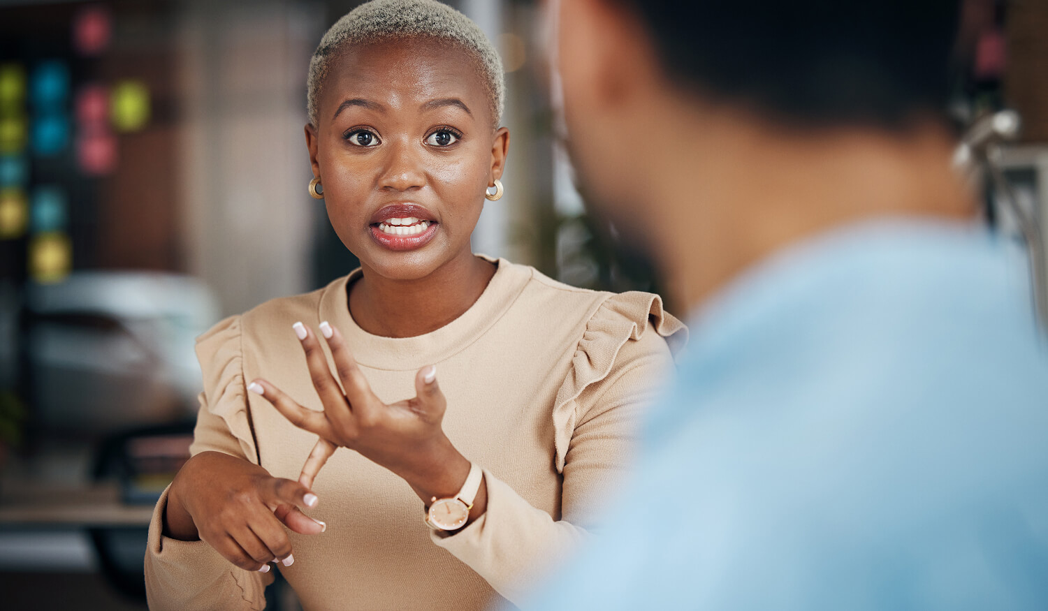 Business owner discussing marketing strategy for her Raleigh business with a colleague