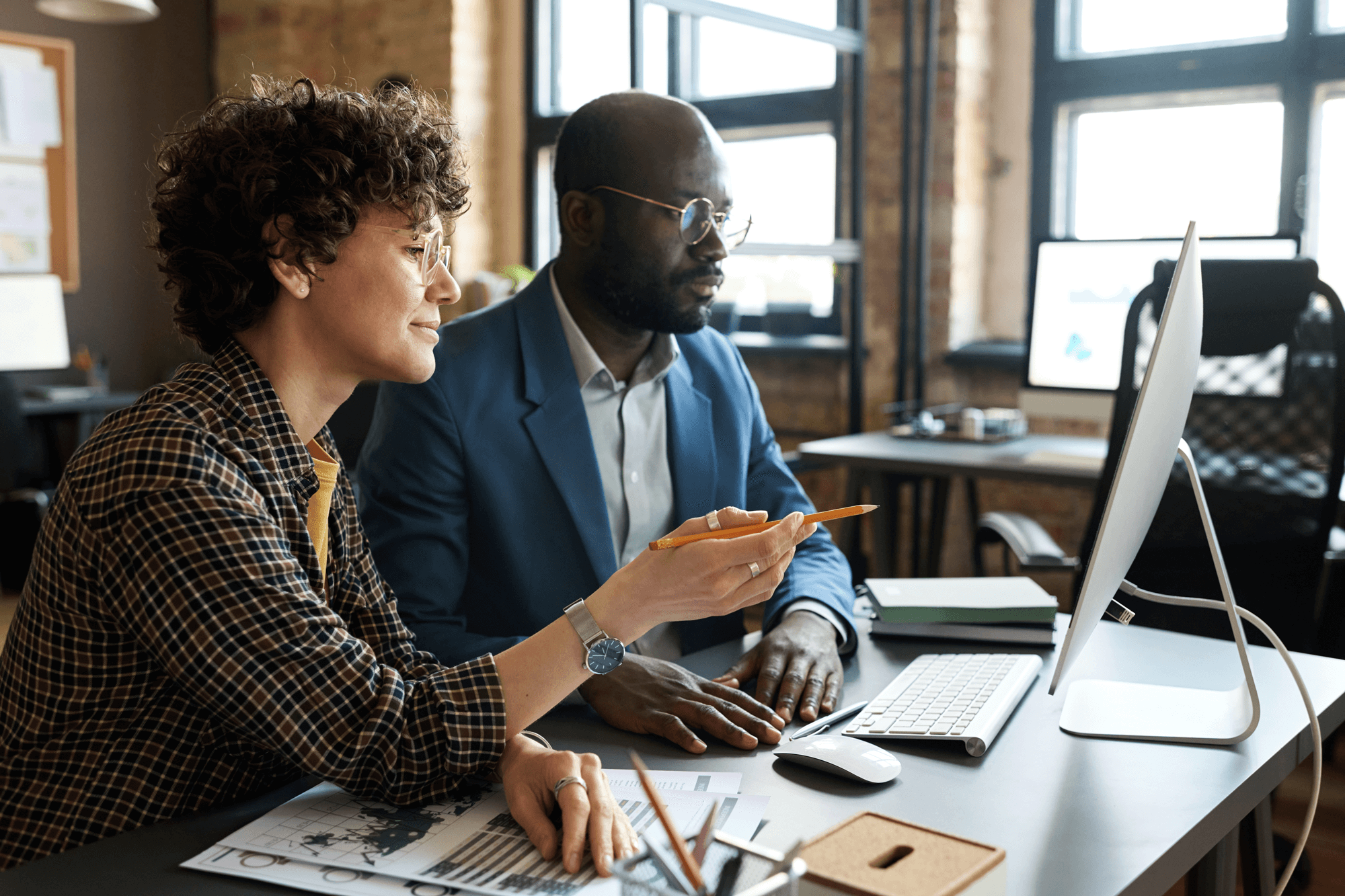 Marketing strategist and business owner reviewing SEO metrics and KPIs on screen — highlighting the importance of data-driven reporting for Raleigh growth campaigns.