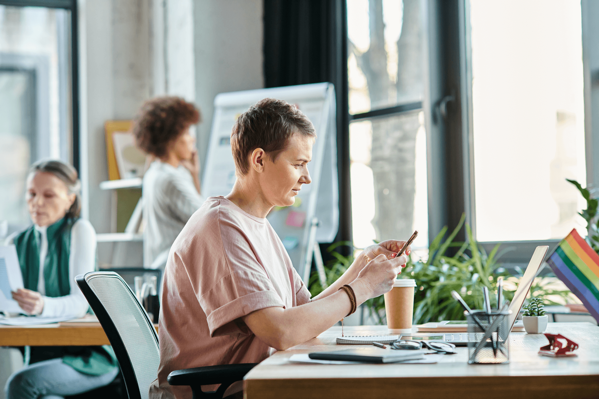 Raleigh nonprofit team collaborating in a modern office, showcasing inclusive culture and local community focus — reinforcing the importance of local SEO for mission-driven organizations.